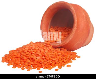 Some fresh red lintils in clay pottery Stock Photo