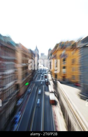 Blurred city street with traffic motion and zoom effect in Italian urban scene Stock Photo