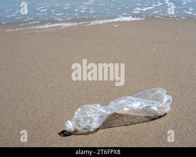 plastic bottle on the beach garbage dump Stock Photo