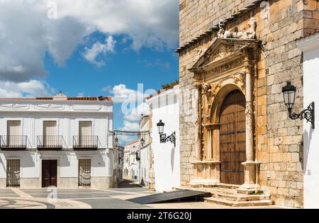 Plaza Magdalena with the entrance to the Church of Santa Maria Magdalena (Iglesia de Santa Maria Magdalena) on the right, Olivenza, Badajoz, Extremadu Stock Photo