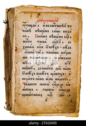 Dilapidated yellowed pages of an old church Old Church Slavonic book. Isolated on white Stock Photo