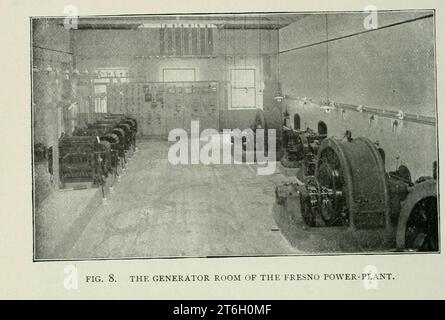THE GENERATOR ROOM OF THE FRESNO POWER-PLANT from the Article THE WONDERFUL EXPANSION IN THE USE OF ELECTRIC POWER. By Louis Bell  from The Engineering Magazine DEVOTED TO INDUSTRIAL PROGRESS Volume XII October 1896 to March 1897 The Engineering Magazine Co Stock Photo