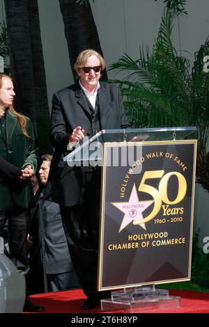 T Bone Burnett at the Hollywood Chamber of Commerce ceremony to honor Rock and Roll Legend Roy Orbison Posthumously with the 2,400th star on the Hollywood Walk of Fame in Hollywood, CA, January 29, 2010. Photo by: Joe Martinez Shooting Star Stock Photo