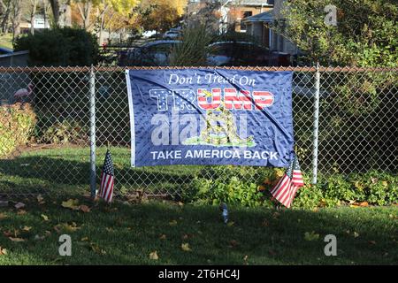 Don't Tread on Trump Take America Back flag on fence in autumn in Des Plaines, Illinois Stock Photo