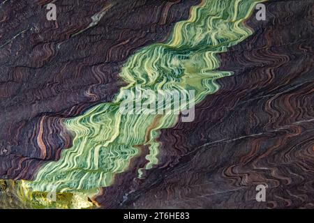 Macro detail of the folded schist metamorphic rock Stock Photo