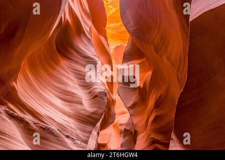 A narrow passage through the high walls of lower Antelope Canyon, Page, Arizona Stock Photo