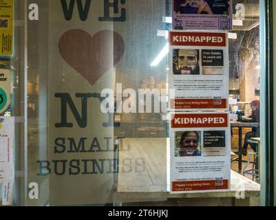 Kidnapped flyers are seen posted on the window of a coffee shop in the Chelsea neighborhood of New York on Wednesday, November 1, 2023. The flyers are an initiative created by New York based Israeli artists to raise awareness of the missing after the Hamas attack on Israel last week. (© Richard B. Levine) Stock Photo