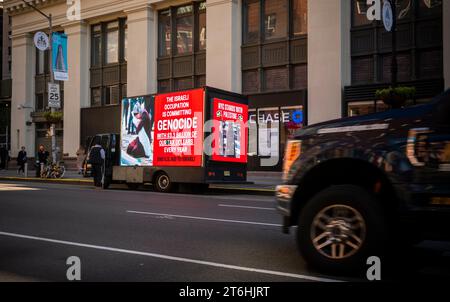 A truck accusing Israel of genocide related to the Hamas terrorist attack, in Chelsea in New York on Friday, November 3, 2023. (© Richard B. Levine) Stock Photo