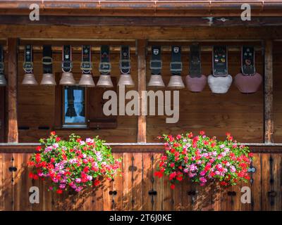 Balcony with geraniums and cowbells Stock Photo