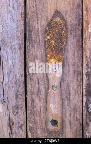 Old painting tools, rusty spatula Stock Photo