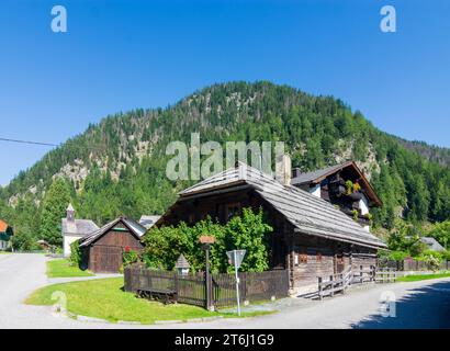 Mallnitz, historic wooden house Schusterkeusche, as a typical Einhof house in Nationalpark Hohe Tauern, Carinthia, Austria Stock Photo