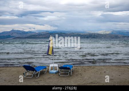 Kalamaki, Corfu, Greece, view from Kalamaki beach in the northeast of the Greek island Corfu over the Ionian Sea towards mainland Albania. Stock Photo