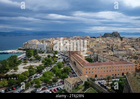 Corfu Town, Corfu, Greece, Corfu Town city overview with the Old Port, the Greek Orthodox Church Agios Spiridon and the New Fortress, in the background the mainland of Albania. Stock Photo