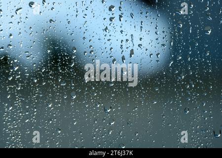 Raindrops on a window pane. Stock Photo