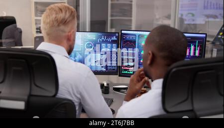 African American Data Analyst Using Data Analytics KPI Dashboard Stock Photo