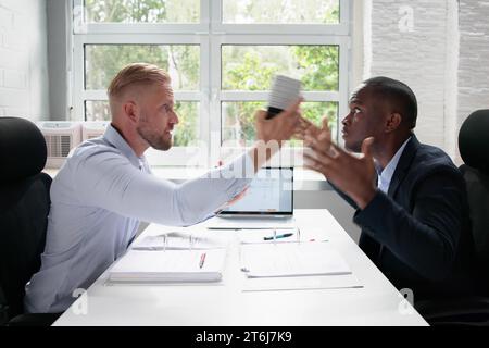 Angry African American Man Shouting To Other In Conflict Stock Photo