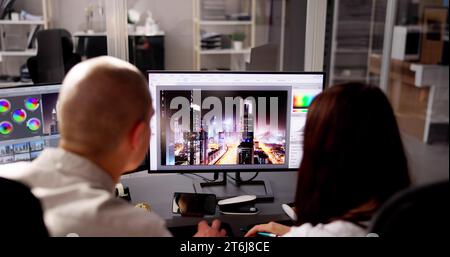 Graphic Web Designer Artist Using Computer To Design Stock Photo