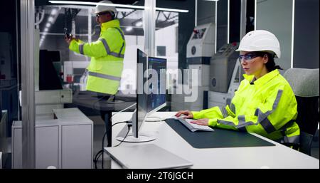 Engineer Operators Using Scada System At Industrial Plant Stock Photo