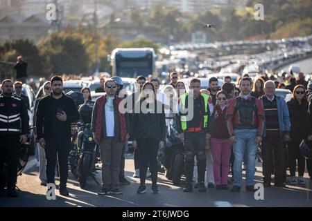 Istanbul, Turkey. 10th Nov, 2023. People stand in silence at 09:05 a.m to commemorate the death time of Mustafa Kemal Ataturk, founder of the Republic of Turkey, on the 85th anniversary of his demise at July 15th Martyrs Bridge in Istanbul. (Photo by Onur Dogman/SOPA Images/Sipa USA) Credit: Sipa USA/Alamy Live News Stock Photo