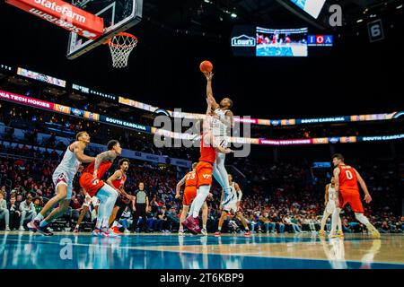 November 10, 2023: South Carolina Gamecocks guard Ta'Lon Cooper (55) shoots over Virginia Tech Hokies guard Sean Pedulla (3) during the first half of the ''He Gets Us'' Hall of Fame Series 2023 matchup at Spectrum Center in Charlotte, NC. (Scott Kinser/CSM) Stock Photo