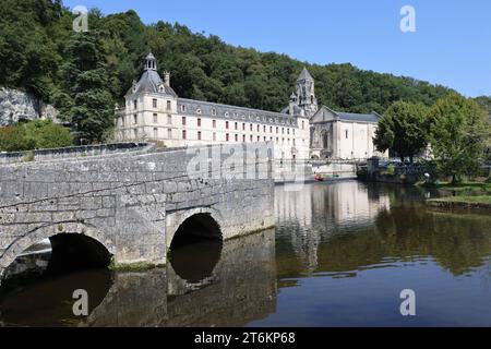 Brantôme in Périgord also called the Venice of Périgord because of the Dronne river which crosses it on all sides. Abbey embedded in the cliff, troglo Stock Photo