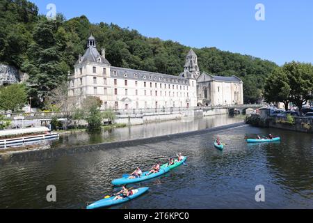 Brantôme in Périgord also called the Venice of Périgord because of the Dronne river which crosses it on all sides. Abbey embedded in the cliff, troglo Stock Photo