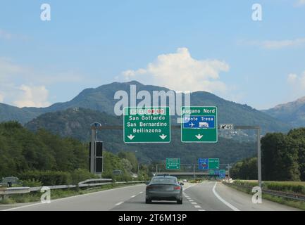 portal with road signs on the motorway with directions to locations in Switzerland Stock Photo