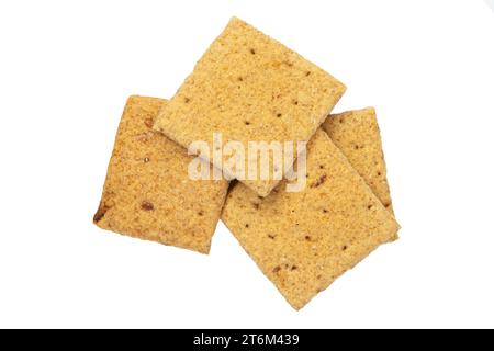 Several square crackers. Carbohydrate snack. Isolated on white background. File contains clipping path Stock Photo