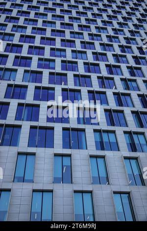 Brussel , Brabant, Belgium 11 06 2023 Vertical outdoor exterior front view of grey skyscaper building of the Beobank head-offices facade with typical Stock Photo