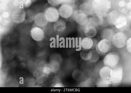 Glitter bokeh black background for use as a texture layer in your project. Stock Photo
