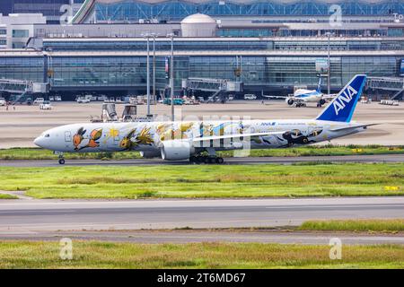 Tokyo, Japan - September 25, 2023: ANA All Nippon Airways Boeing 777-300ER airplane with Pokemon Eevee special livery at Tokyo Haneda Airport (HND) in Stock Photo