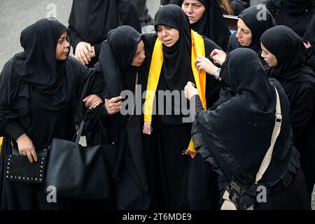 11 November 2023, Lebanon, Beirut: The mother (C) of pro-Iranian militant Mohamad Ali Assaf, who was killed alongside six other comrades in one of the party's highest death tolls in a single day, weeps during her son's funeral procession in Beirut's southern suburb. Since Hamas made a surprise attack on October 7th, more than 60 Hezbollah fighters have been killed. Photo: Marwan Naamani/dpa Stock Photo