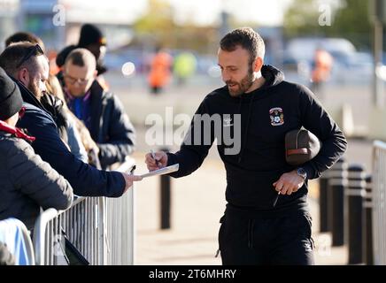 Coventry City's Liam Kelly signs autographs for fans ahead of the Sky Bet Championship match at the Coventry Building Society Arena, Coventry. Picture date: Saturday November 11, 2023. Stock Photo