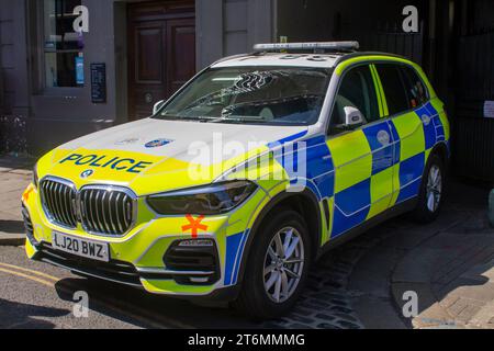 15 June 2023 A BMW police vehicle in Hi-Viz livery parked close to Windsor castle in Berkshire England while the Bobbies engage in crowd contrl duties Stock Photo
