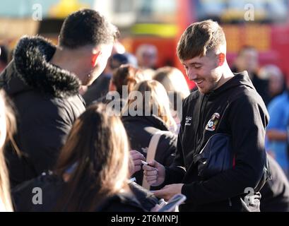 Coventry City's Josh Eccles signs autographs for fans ahead of the Sky Bet Championship match at the Coventry Building Society Arena, Coventry. Picture date: Saturday November 11, 2023. Stock Photo