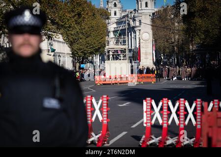London, UK 11 November, 2023. The police guard the Cenotaph. Tommy Robinson voiced the motive to deter any Pro-Palestinian protesters that might want to march through Whitehall during Remembrance weekend. This comes after five consecutive weeks of protests to stop the war in Gaza.ÊAndy Barton/Alamy Live News Stock Photo