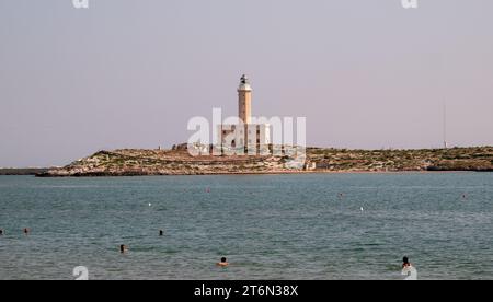 Vieste, Italy - 25 August 2023: view of port of Vieste with lighthouse Stock Photo