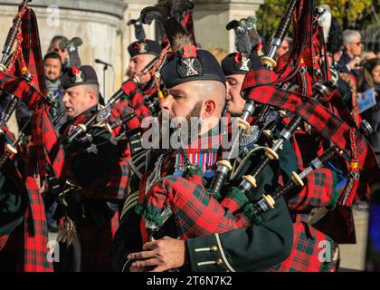 London, UK 11th Nov 2023. Pipers march past. Troups, military and civil participants as the parade passes St Paul's Cathedral. This year's Lord Mayor's Show brings together 7,000 people, including charities, community groups, the armed forces, 250 horses, and over 150 floats in a three-mile-long parade, including the golden State Coach with new Lord Mayor Michael Mainelli. Credit: Imageplotter/Alamy Live News Stock Photo