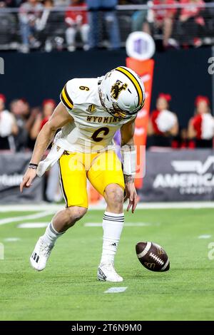 November 10, 2023: Wyoming Cowboys quarterback Andrew Peasley (6) looks to pick up a fumble during the first half of the college football game featuring the Wyoming Cowboys and the UNLV Rebels at Allegiant Stadium in Las Vegas, NV. Christopher Trim/CSM. Stock Photo