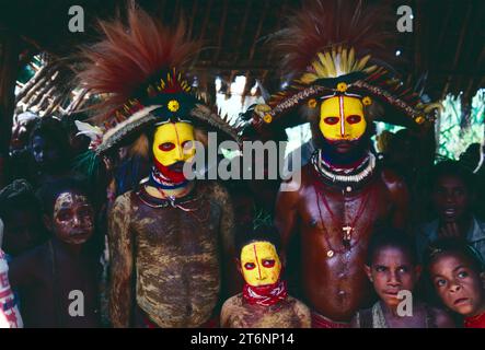 Papua New Guinea. Hela Province. Local tribesmen and children. Stock Photo