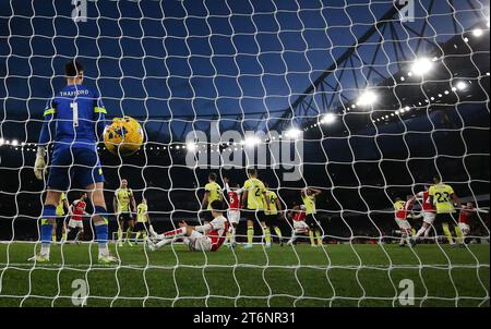 Arsenal's Oleksandr Zinchenko (fourth left) celebrates scoring their side's third goal of the game as Burnley goalkeeper James Trafford looks on during the Premier League match at the Emirates Stadium, London. Picture date: Saturday November 11, 2023. Stock Photo