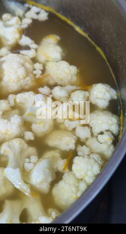 cauliflower boiled in a saucepan, soup lunch vegetables Stock Photo