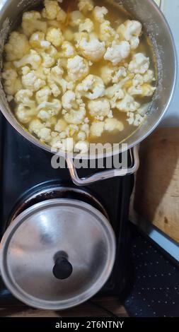 cauliflower boiled in a saucepan, soup lunch vegetables Stock Photo