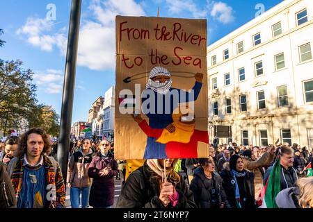 London, UK. 11th November 2023. Hundreds of thousands of demonstrators march through central London in support of the people of Gaza. Credit: Grant Rooney/Alamy Live News Stock Photo