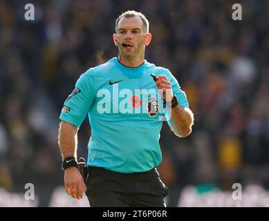 Wolverhampton, England, 11th November 2023.  Referee Tim Robinson during the Premier League match at Molineux, Wolverhampton. Picture credit should read: Andrew Yates / Sportimage Stock Photo