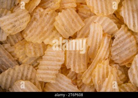 close up of corrugated potato chips, texture background Stock Photo