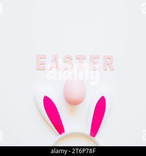 Easter word with bunny ears egg Stock Photo