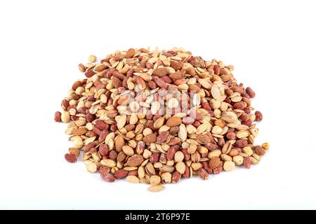 Mixture of dried fruits and nuts in a copper bowl. A mixture of peanuts, pistachios, almonds, hazelnuts and cashews. Stock Photo