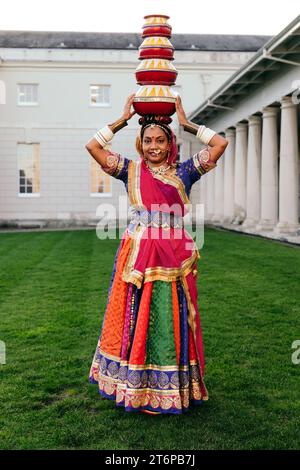 London, UK. 11th November 20234 Diwali is celebrated at the National Maritime Museum in Greenwich, as organised by Mehala Ford, founder of the South Asian Arts Collective Commongrounds. Featuring workshops for constructing diya lamps, Sari draping, and Rangoli creation, as well as dance performances by “Akademi” group from Sarjan Nartan Academy lead by Neha Patel. The event concluded with a parade with traditional Indian dhol drummers and diya lanterns carried by the public. © Simon King/ Alamy Live News Stock Photo