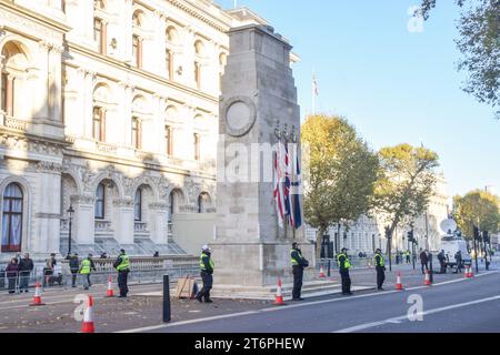 London, UK. 11th November 2023. Police officers guard The Cenotaph war memorial in Whitehall ahead of Armistice Day events. Stock Photo